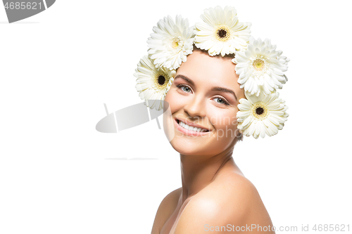 Image of beautiful girl with white flowers on head