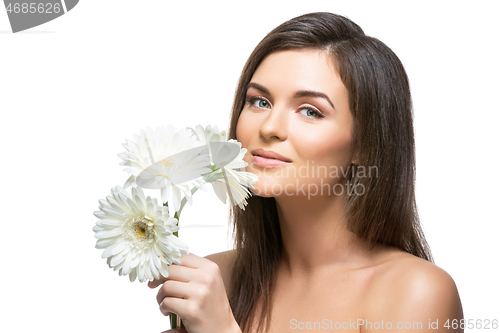 Image of beautiful girl with white flowers