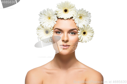 Image of beautiful girl with white flowers on head