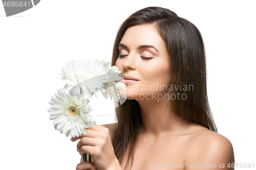 Image of beautiful girl with white flowers