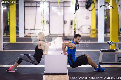 Image of athletes working out their arms