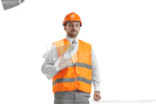 Image of The builder in orange helmet isolated on white