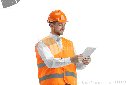 Image of The builder in orange helmet isolated on white