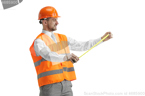 Image of The builder in orange helmet isolated on white