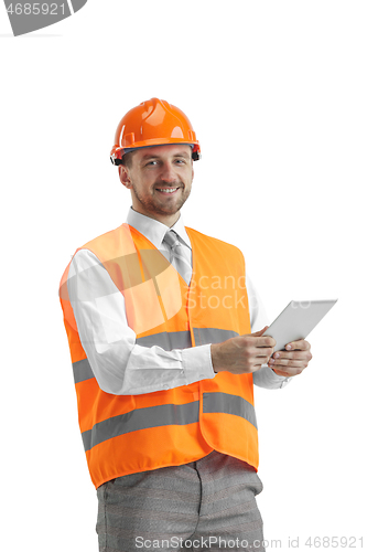 Image of The builder in orange helmet isolated on white