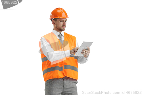 Image of The builder in orange helmet isolated on white