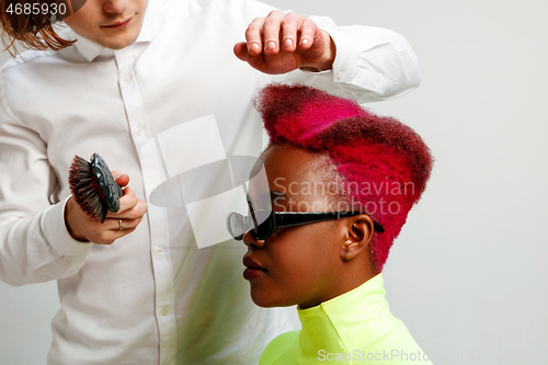 Image of Picture showing adult woman at the hair salon