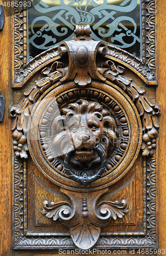 Image of vintage door handle in the form of a lions head