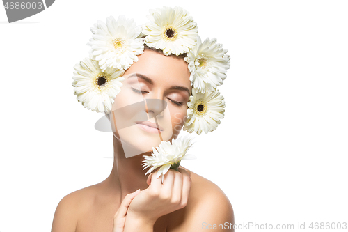 Image of beautiful girl with white flowers on head