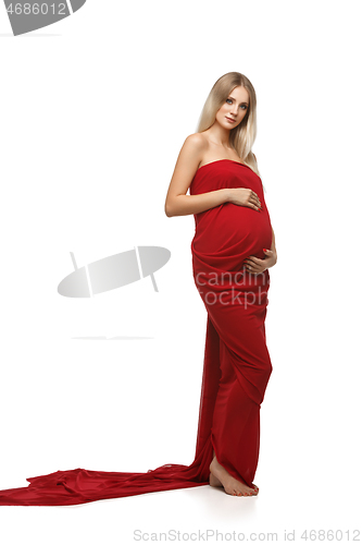 Image of Pregnant girl in red dress