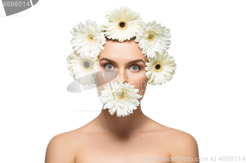 Image of beautiful girl with white flowers on head