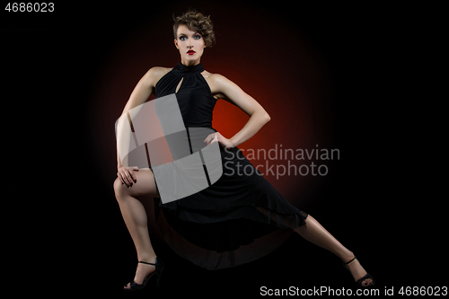 Image of girl dancer in tango dress