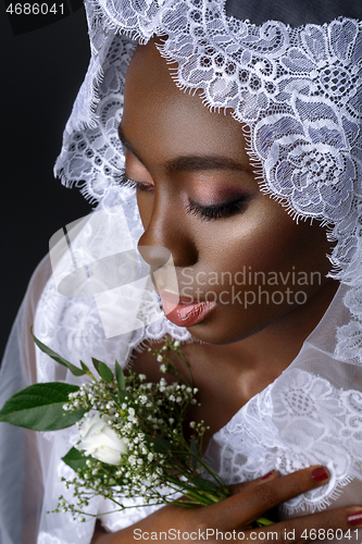 Image of Beautiful african girl with veil hat