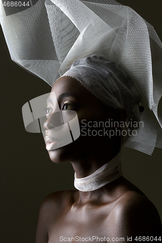 Image of Beautiful african girl with veil hat