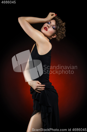 Image of girl dancer in tango dress