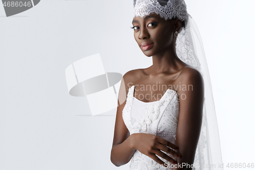 Image of Beautiful african girl with veil hat