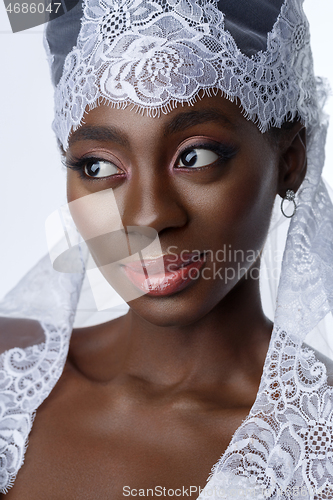 Image of Beautiful african girl with veil hat