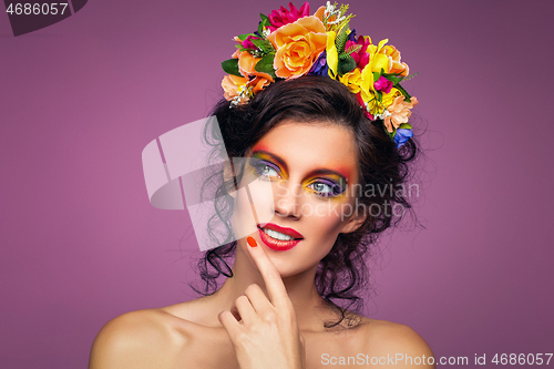 Image of beautiful girl with flower accessories