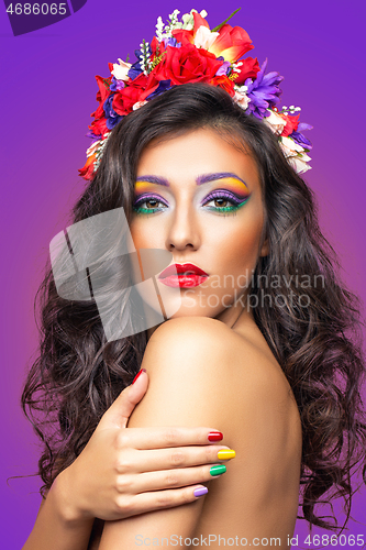 Image of beautiful girl with flower accessories