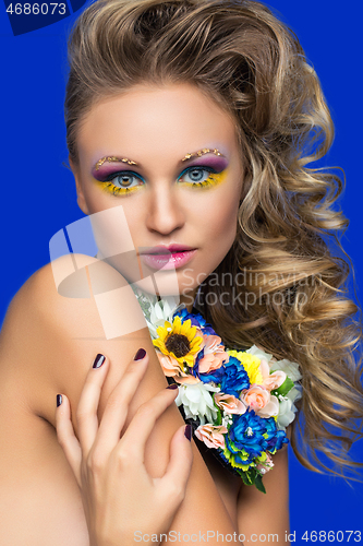 Image of beautiful girl with flower accessories