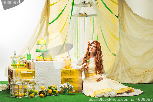 Image of beautiful girl in yellow dress