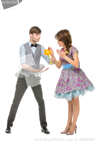Image of boy and girl looking like dolls