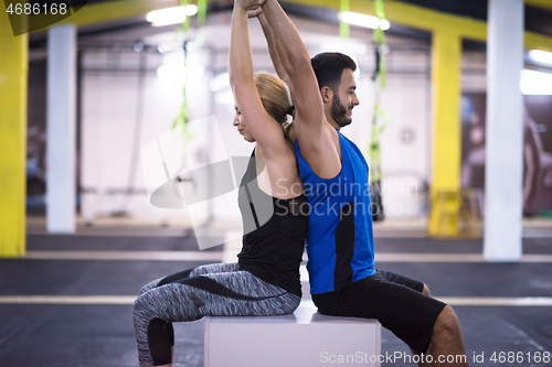 Image of athletes working out their arms