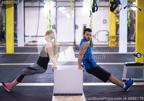 Image of athletes working out their arms