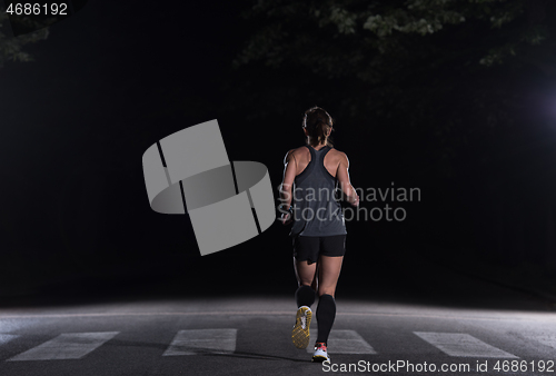 Image of female runner training for marathon