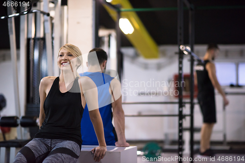 Image of athletes working out their arms