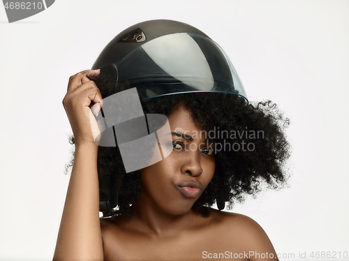 Image of Portrait of attractive woman in motorbike helmet