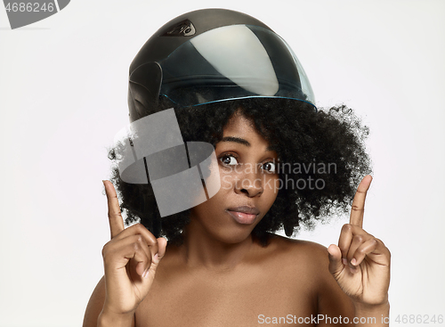 Image of Portrait of attractive woman in motorbike helmet