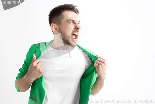 Image of Young casual man shouting. Shout.