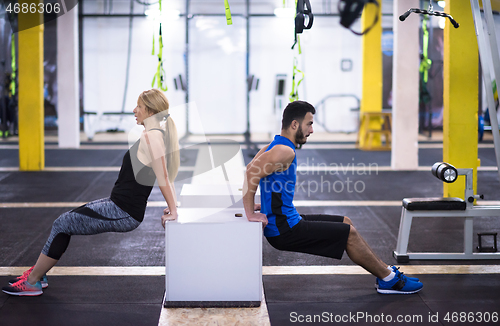 Image of athletes working out their arms