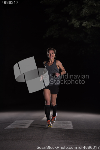 Image of female runner training for marathon