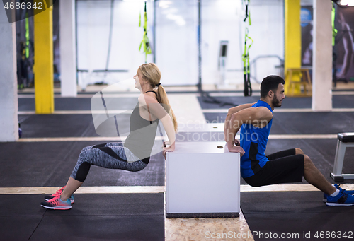 Image of athletes working out their arms