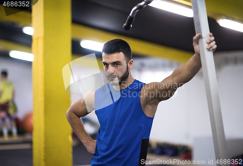 Image of portrait of young man at cross fitness gym