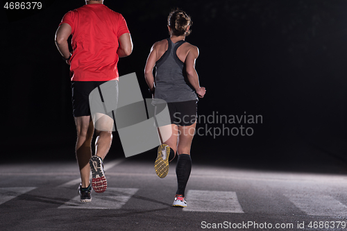 Image of runners team on the night training