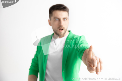 Image of Businessman hand touching empty virtual screen