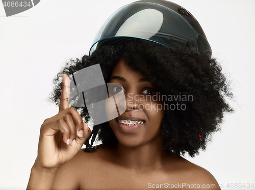 Image of Portrait of attractive woman in motorbike helmet