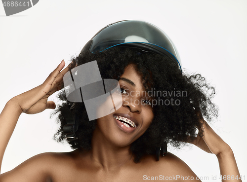 Image of Portrait of attractive woman in motorbike helmet