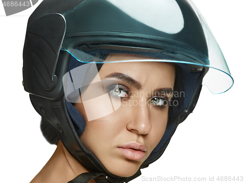 Image of Portrait of attractive woman in motorbike helmet