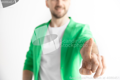 Image of Businessman hand touching empty virtual screen