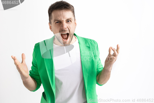 Image of Young casual man shouting. Shout.