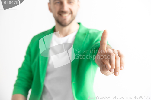 Image of Businessman hand touching empty virtual screen