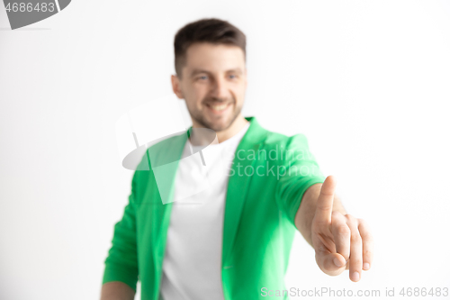 Image of Businessman hand touching empty virtual screen