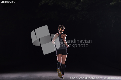 Image of female runner training for marathon