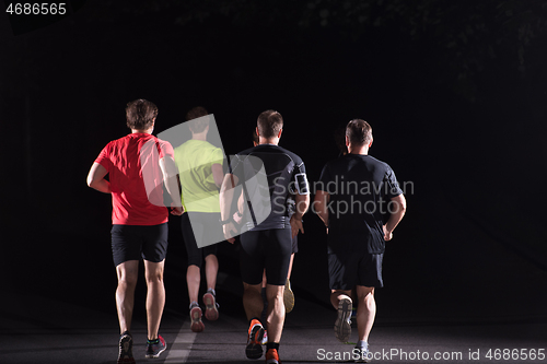 Image of runners team on the night training