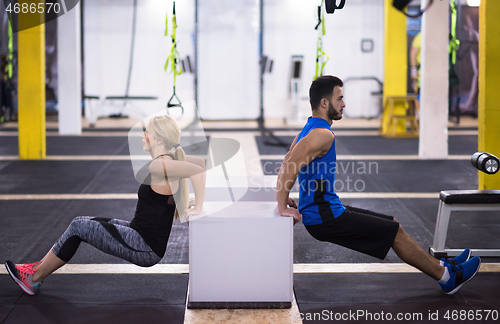 Image of athletes working out their arms