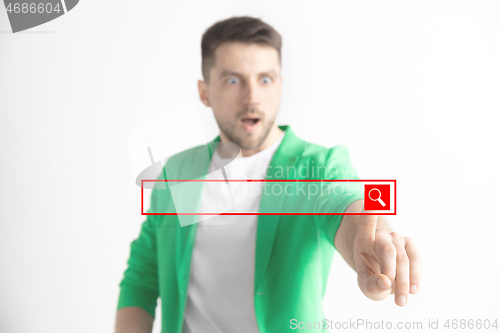 Image of Businessman hand touching empty virtual screen